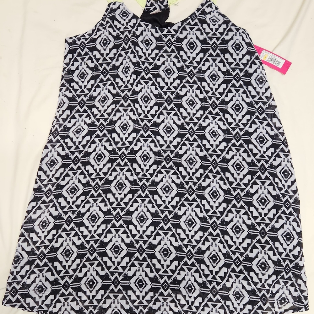 Dressy black and white tank top with light green straps